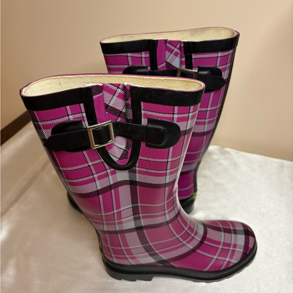 Western Chief rain boots, style plainly purple, one pattern flaw- see pic